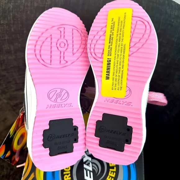 Black and Pink Heelys.